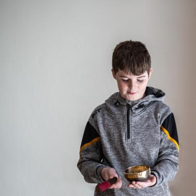 Sound Bath Boy Playing Instrument